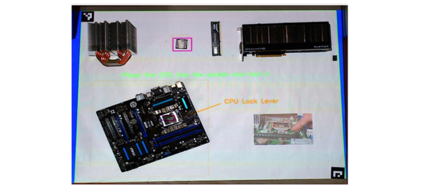 A scene of mainboard assembly workflow. The part (CPU) is highlighted and an arrow shows the position of the CPU lock lever. A video also shows how to close the lock.